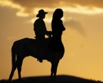cowboy ridig his centaur girl to the sunset
